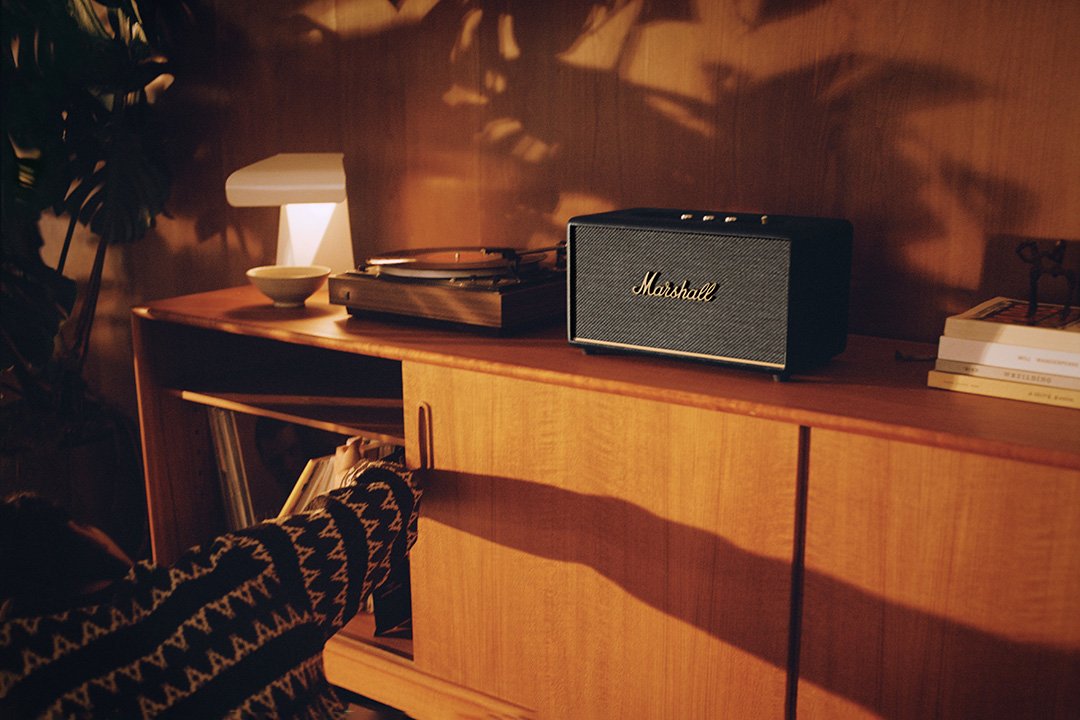 Marshall Stanmore III powered speaker in black on credenza beside record player