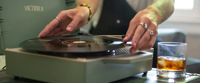 Victrola Carbon Streaming Turntable Lifestyle Record Placed on Plate