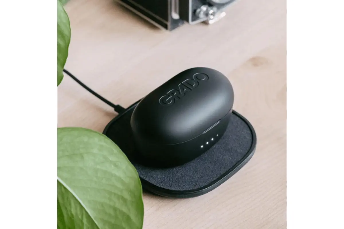 Engraved Grado GT220 Earphones Charging case charging on a wireless charging pad