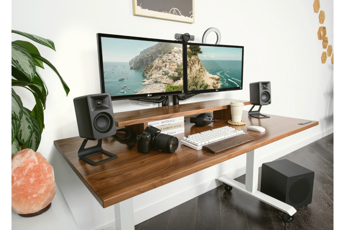 Ora Speakers on desk, creative desk setup