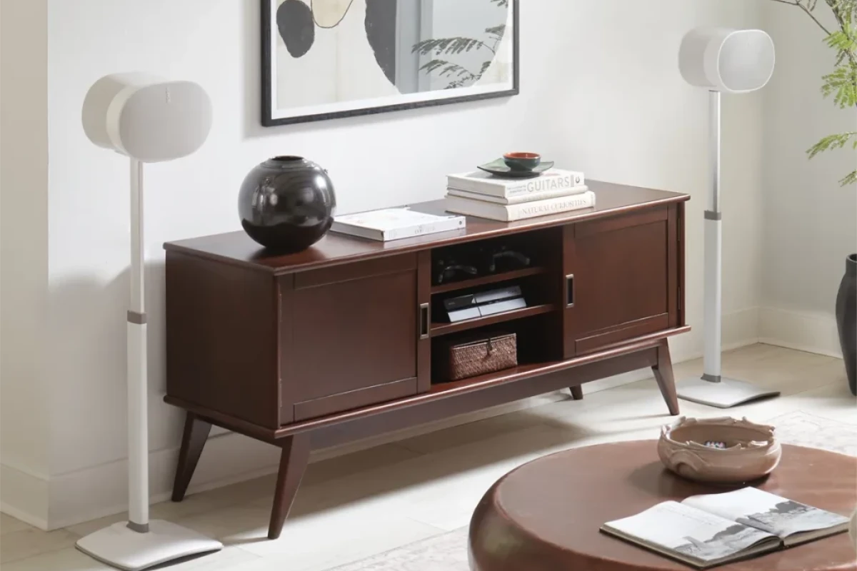 Sanus Height-Adjustable Speaker Stand designed for the Sonos Era 300, featuring a sleek white finish with a sturdy base and adjustable pole for optimal speaker placement.