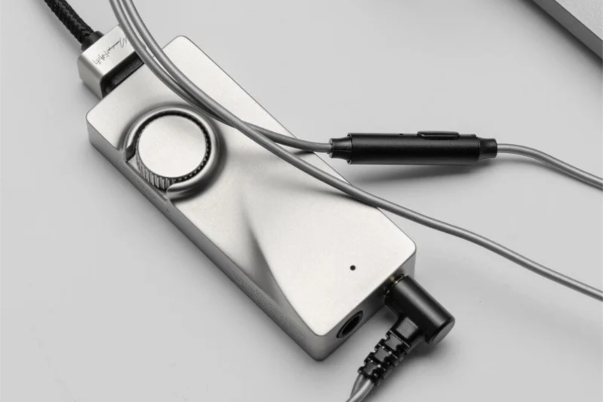 Moondrop MoonRiver 3 DAC/amp connected to a laptop and headphones on a desk.